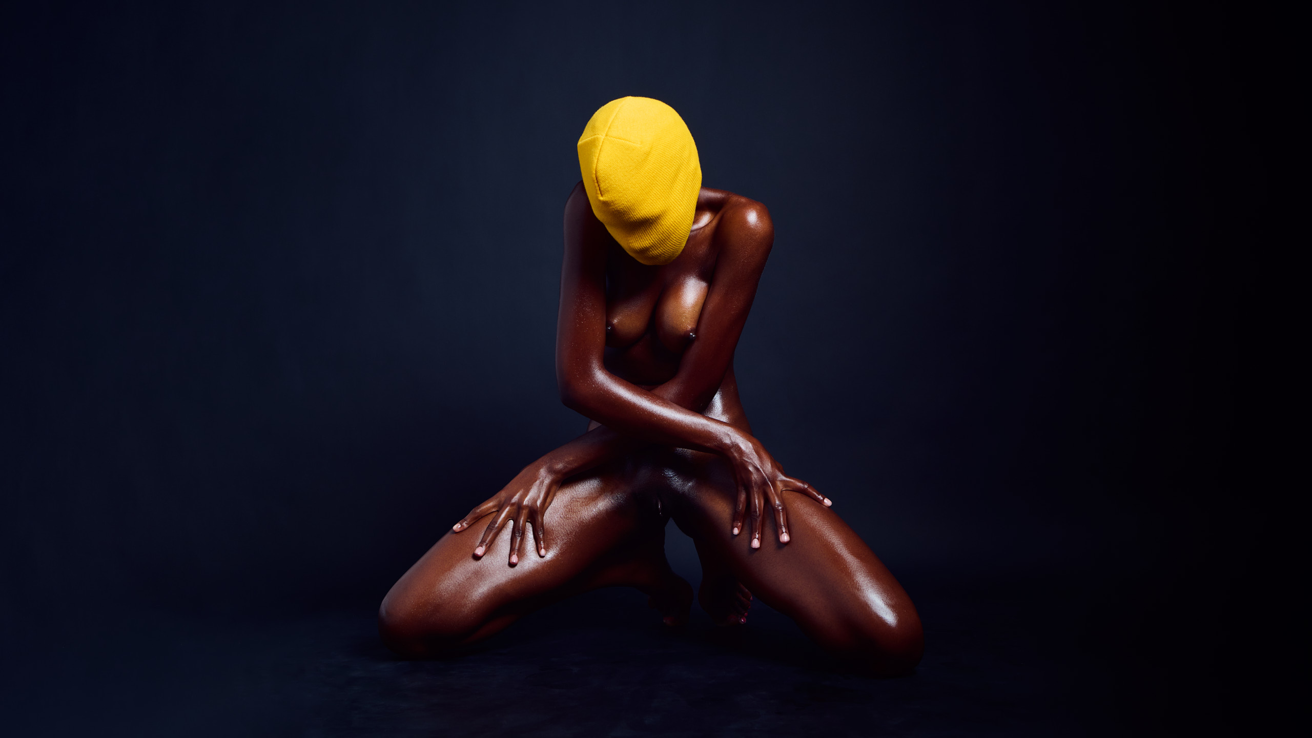 Anonymous Yellowhead dark-skinned yellow beanie concealed identity form gesture physical expression explicit erotic photographer Cinaed Dane