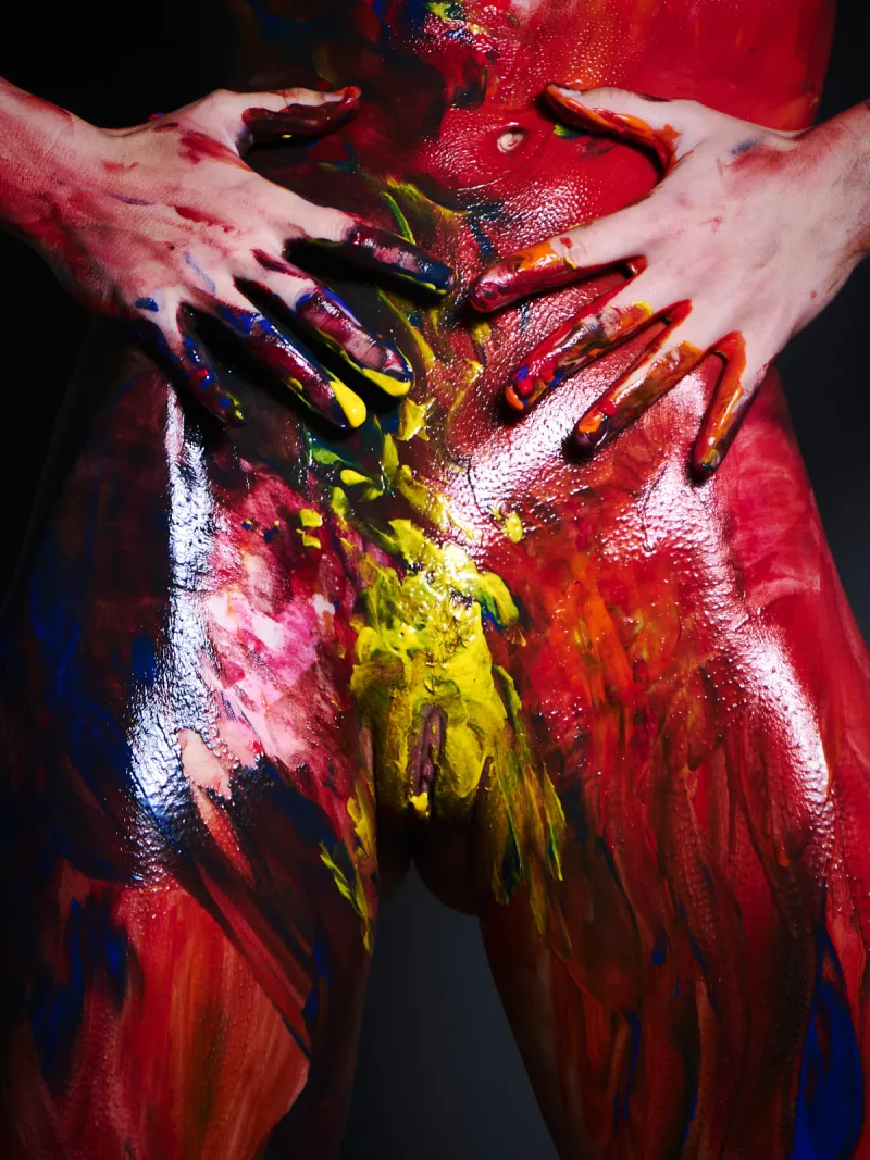 Ulah Bauer nude art model Colored Emotion body paint smear dark backdrop photographer Cinaed Dane