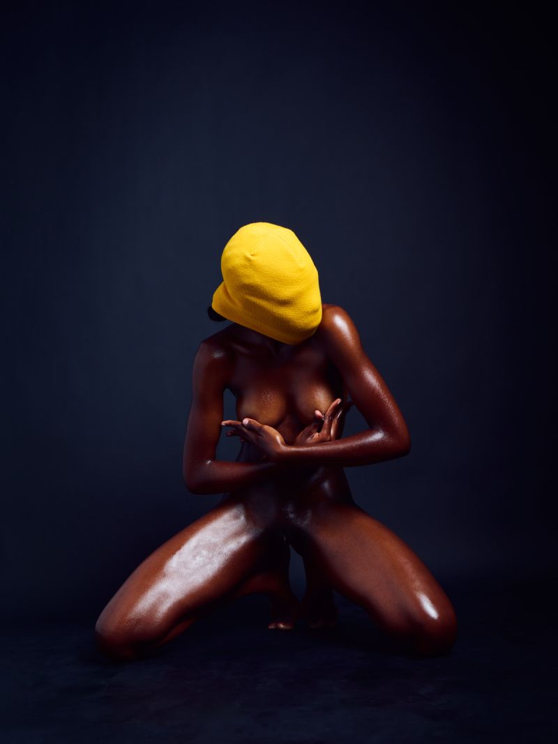 Dark-skinned anonymous Yellowhead yellow beanie form gesture explicit erotic Cinaed Dane photography