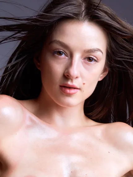 Arina Ostrovskaya Elegant Nude photography Ukrainian elegant proportions brown hair oiled body flying hair by Cinaed Dane