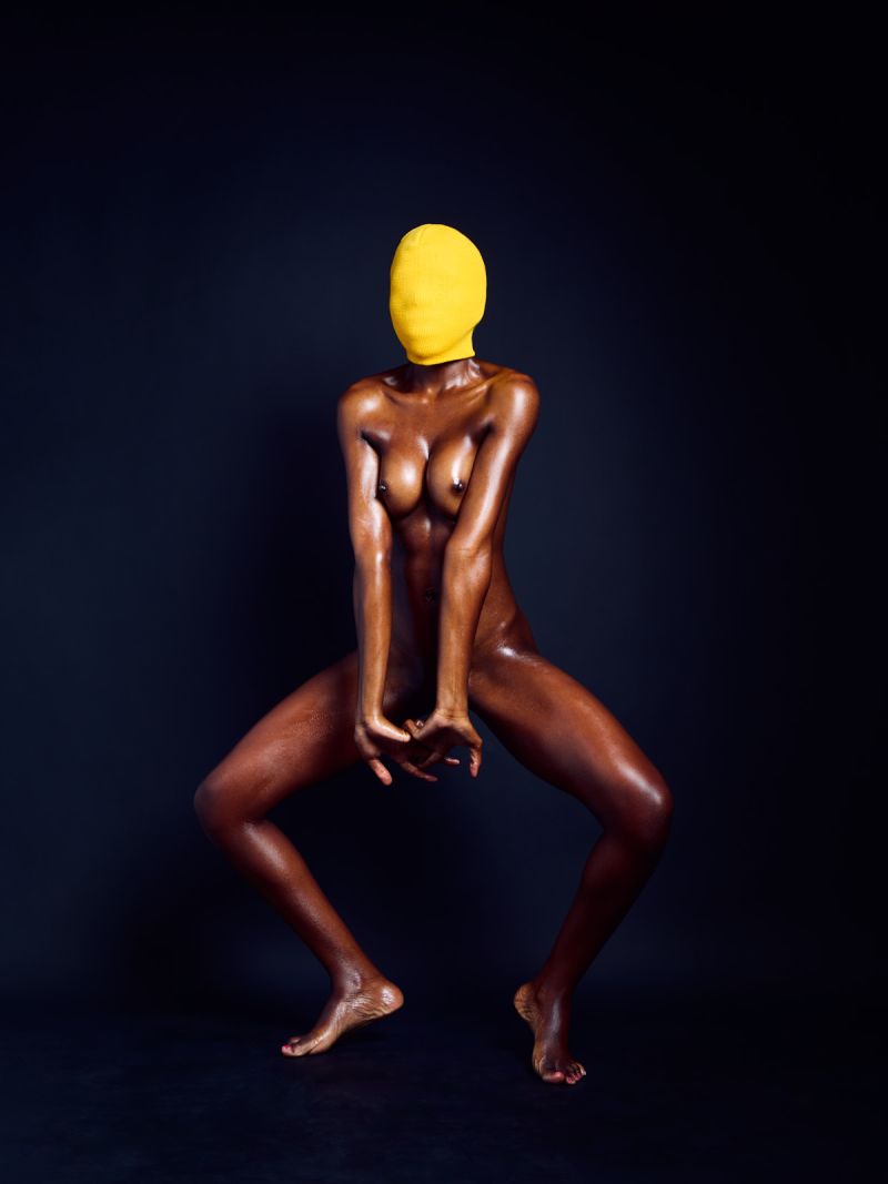 Yellowhead contemporary explicit erotic art anonymous dark-skinned yellow beanie contrast Cinaed Dane