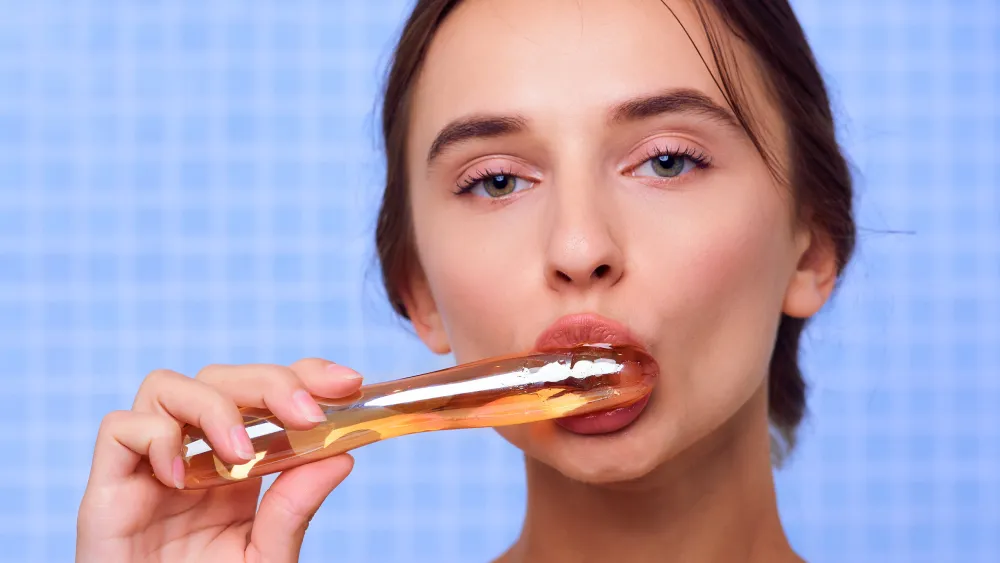 Sensual nude art photograph of Gloria Sol with golden honey texture