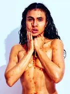 Bold erotic fine art portrait emphasizing playful texture, vibrant color, and confident posture