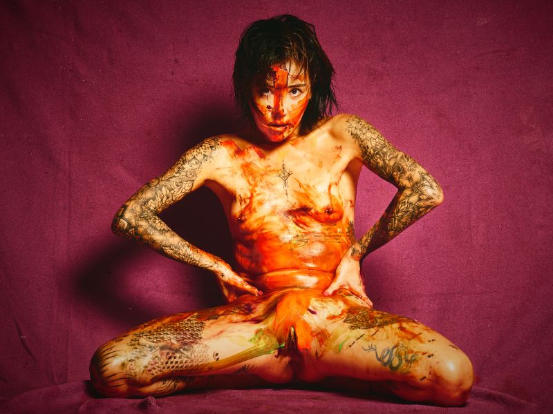 Chloe contemporary nude art Painter vivid orange body paint expressive Barcelona photographer Cinaed Dane