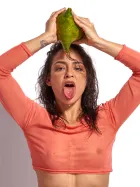 Editorial nude portrait showcasing confidence, expressive gestures, and refined eroticism