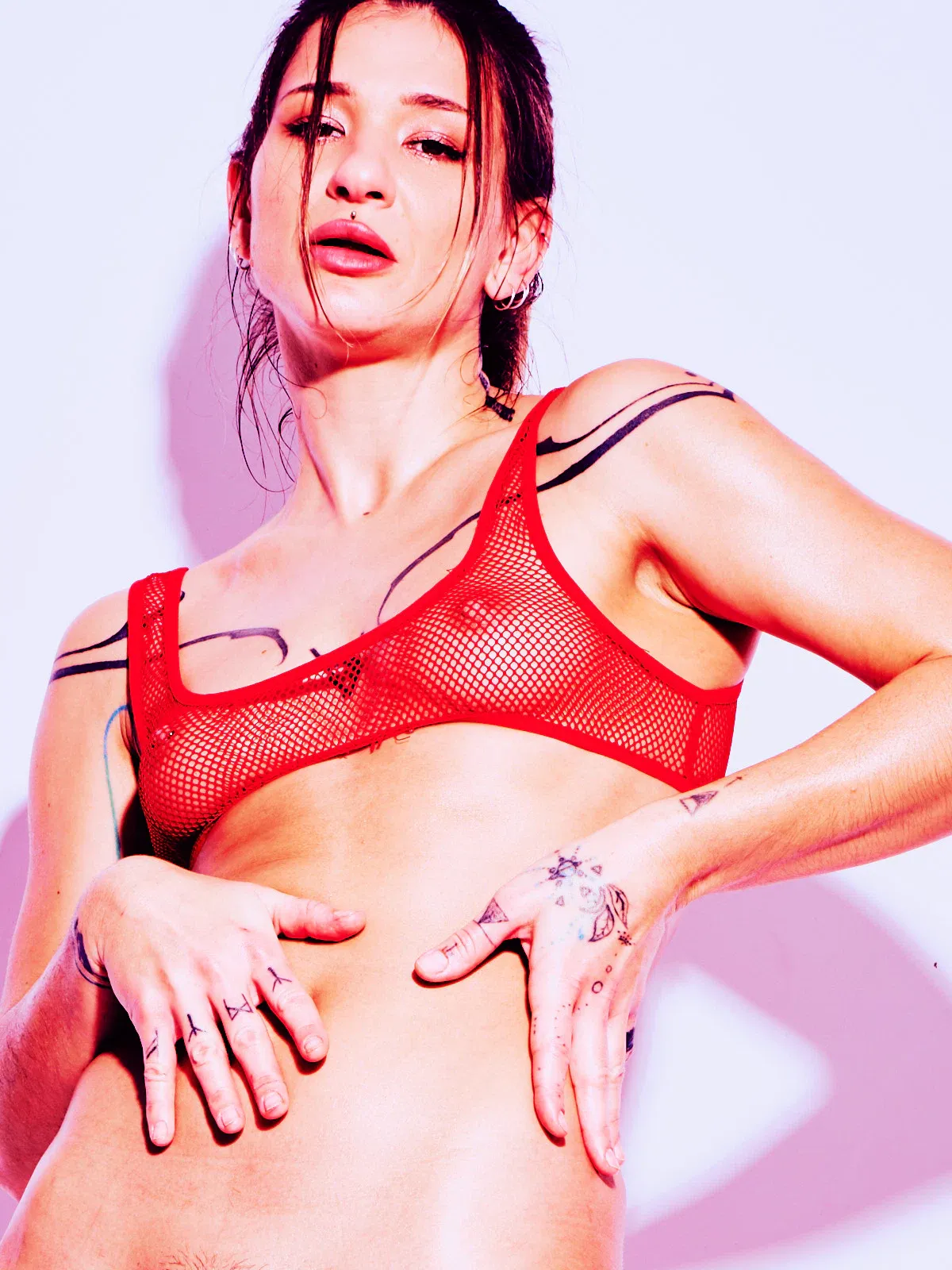 Pink Fruit art nude by Cinaed Dane, model Dharma with pink citrus against studio background